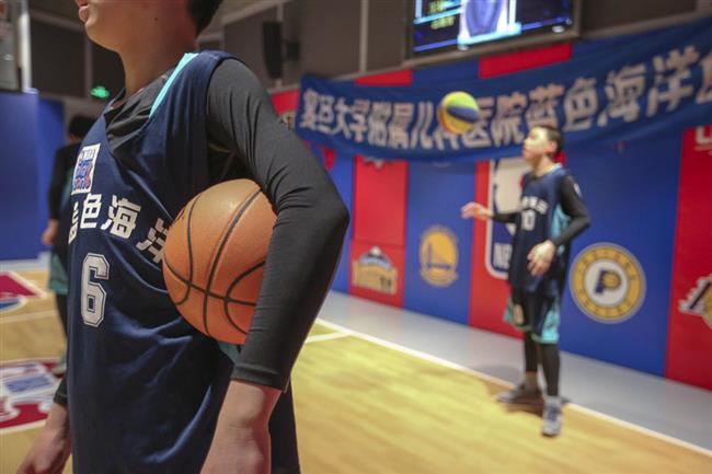 A proud basketball team on special mission