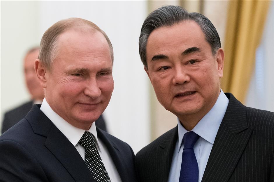 Putin to visit China in June as Beijing, Moscow pledge to develop bilateral ties