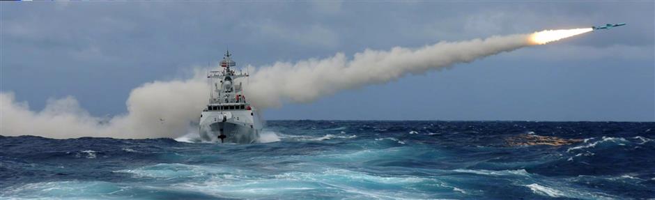 President Xi reviews navy in South China Sea