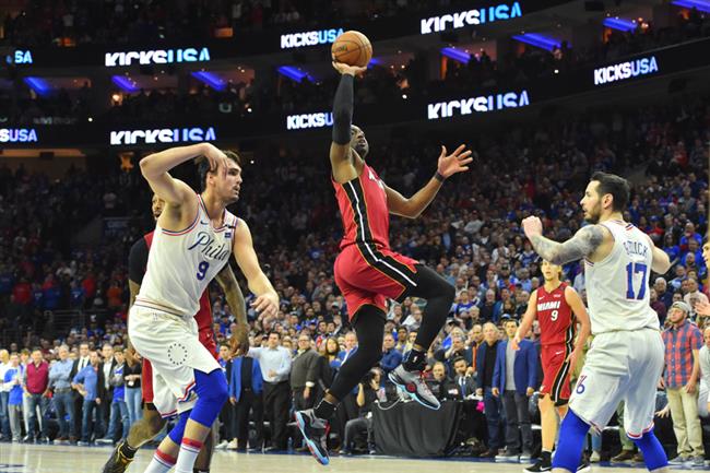 Warriors win as Heat cool 76ers