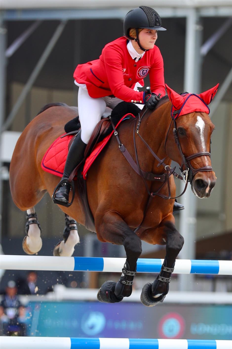 Riders gallop into the second day of show jumping competition