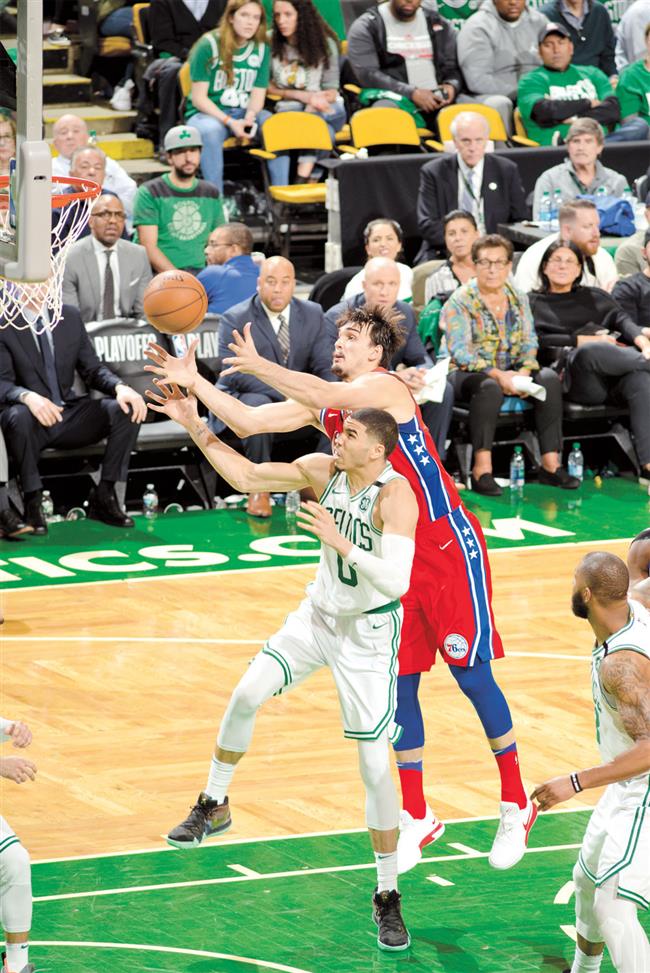 Short-handed Celtics rout Sixers