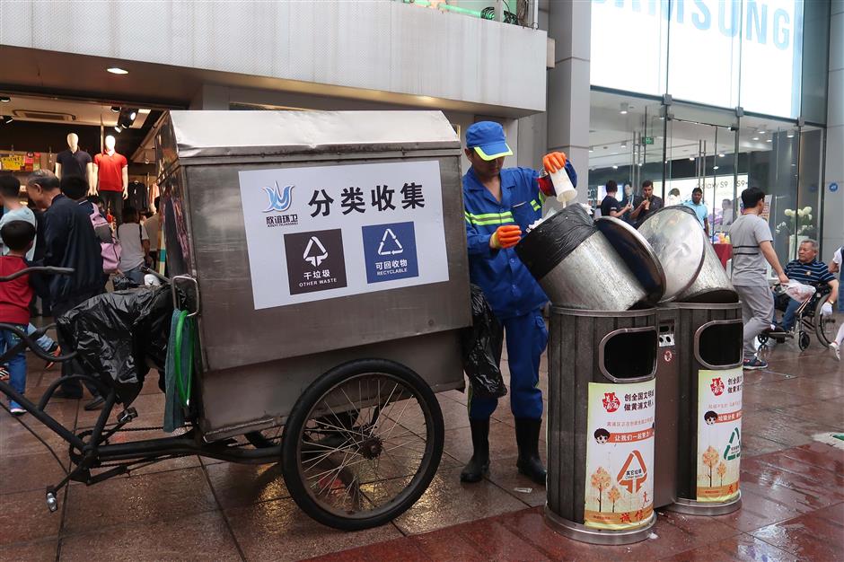 Shanghai trials greener garbage collection carts