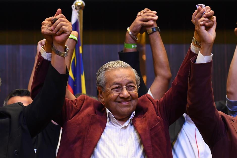 Malaysia's Mahathir, 92, to be sworn in as prime minister after historic poll win