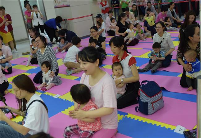 Mother and baby yoga classes a hit on Mother's Day