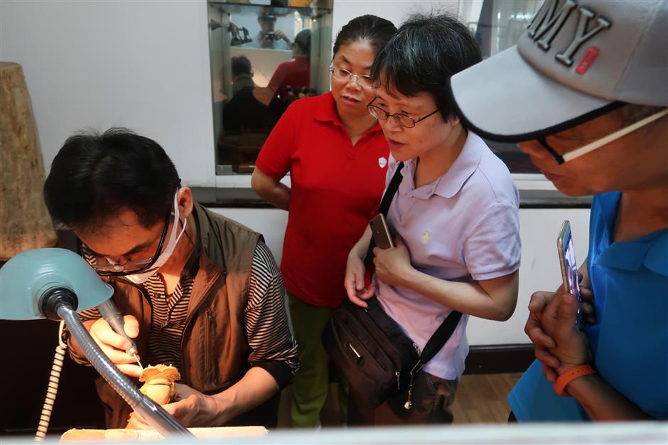 People line up to enjoy a free taste of Shanghai's art and culture