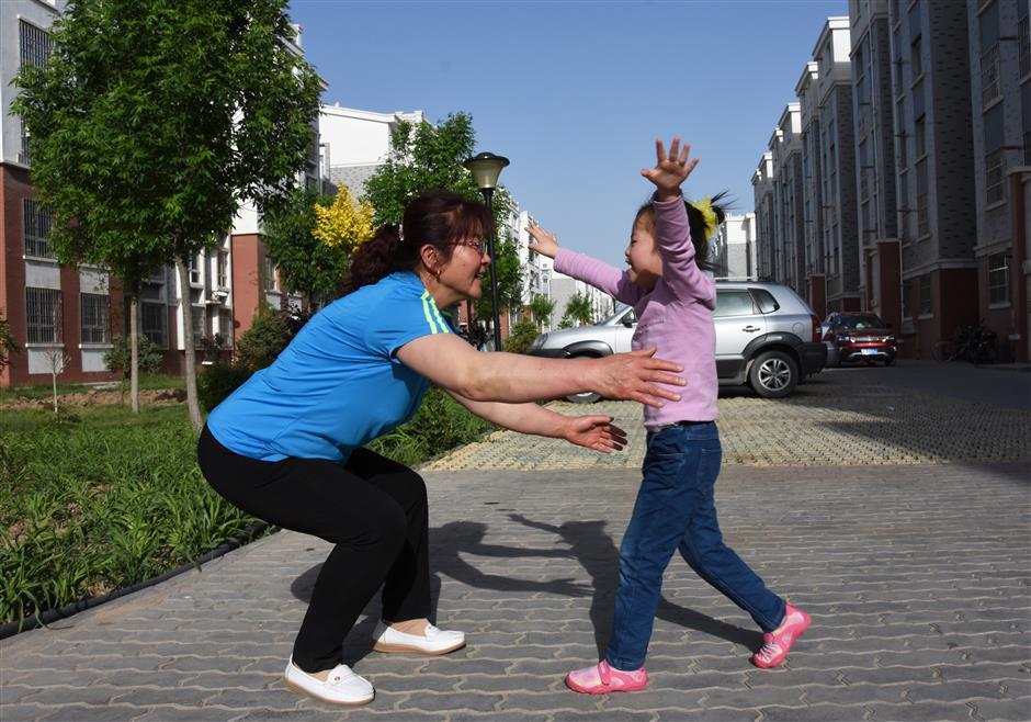 Orphaned kids bask in love of foster moms