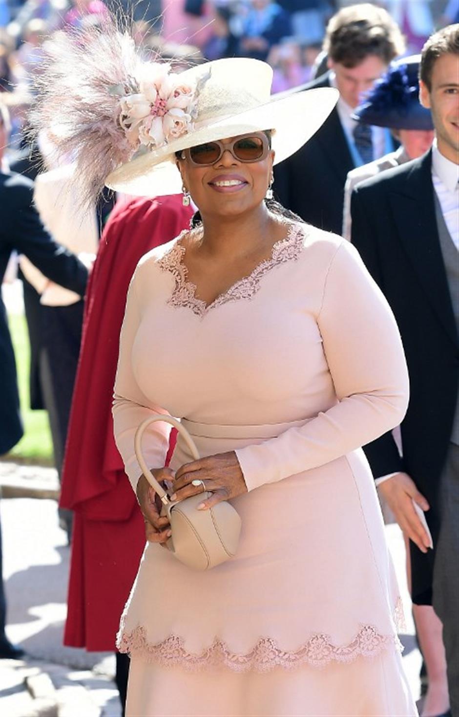 Winfrey, Clooney lead star guests at Britain's royal wedding