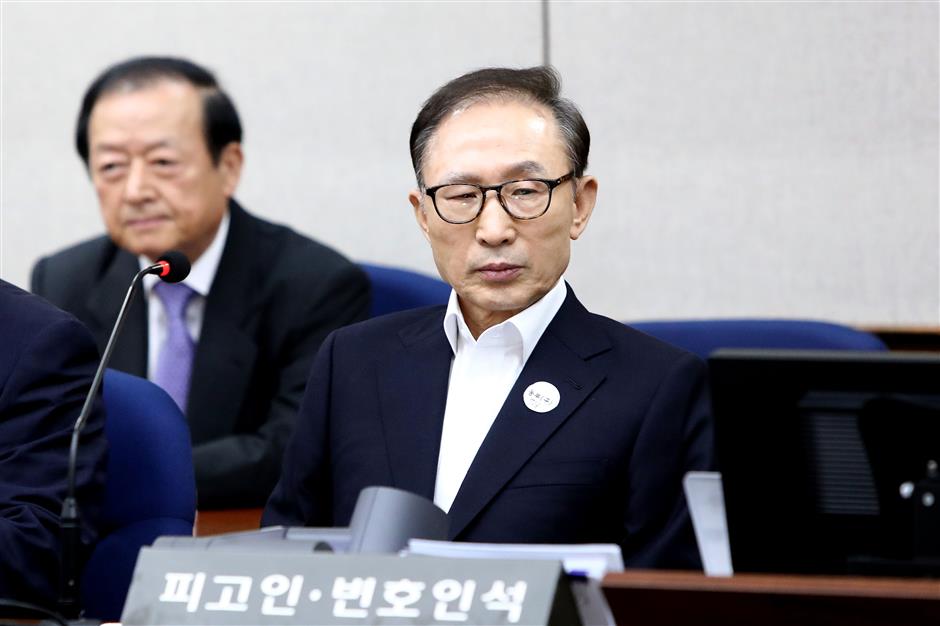 Ex-S.Korean President Lee Myung-bak appears at first trial over corruption charges