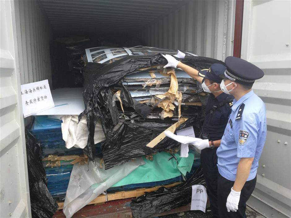 13 held over importing 'foreign garbage'