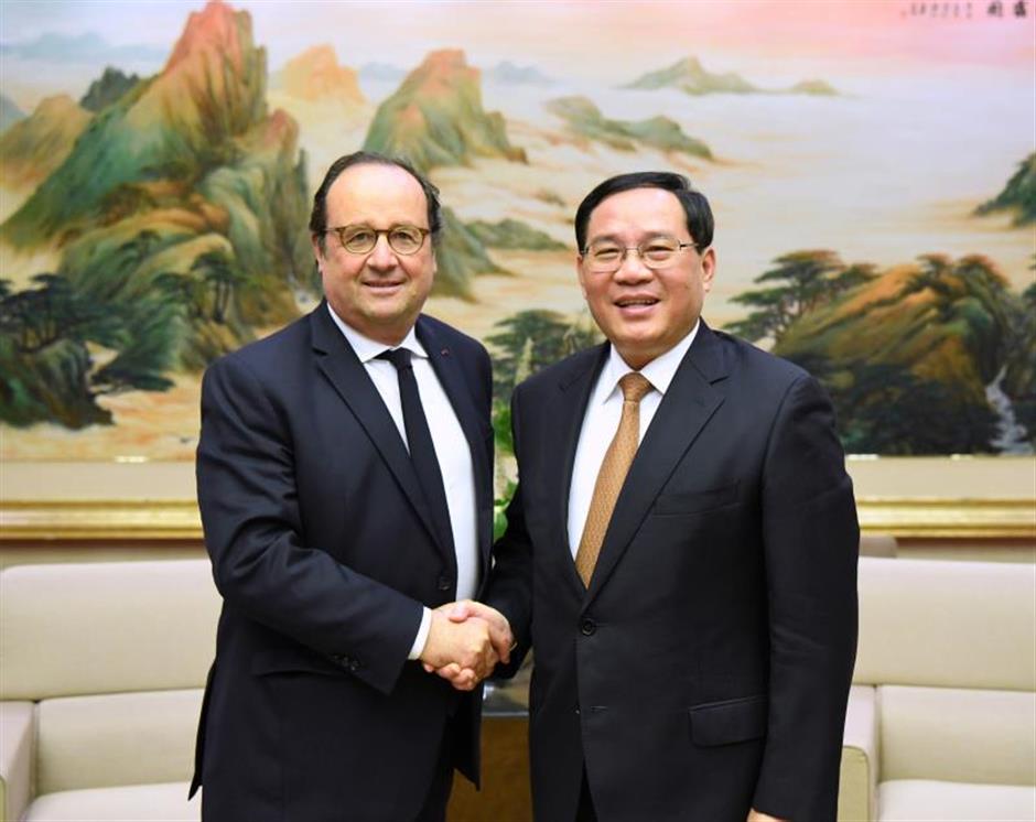 Shanghai Party chief meets former French President Francois Hollande