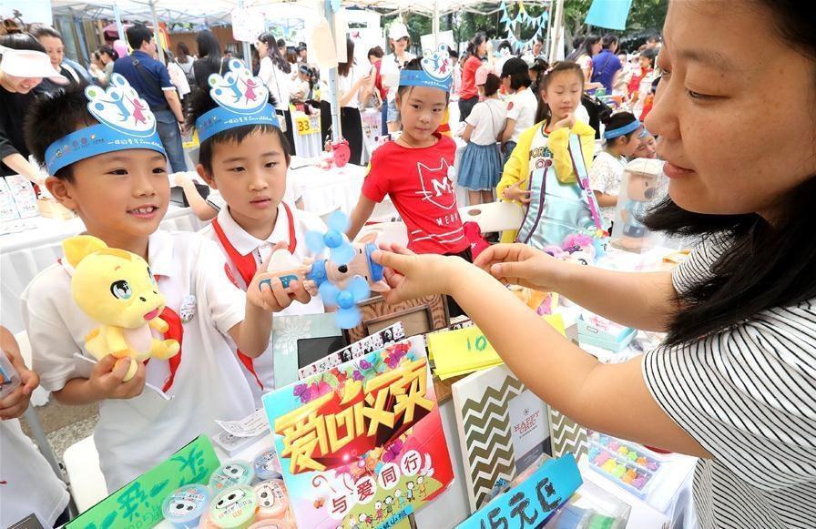 Charity fair held in Shanghai to help children living in impoverished areas