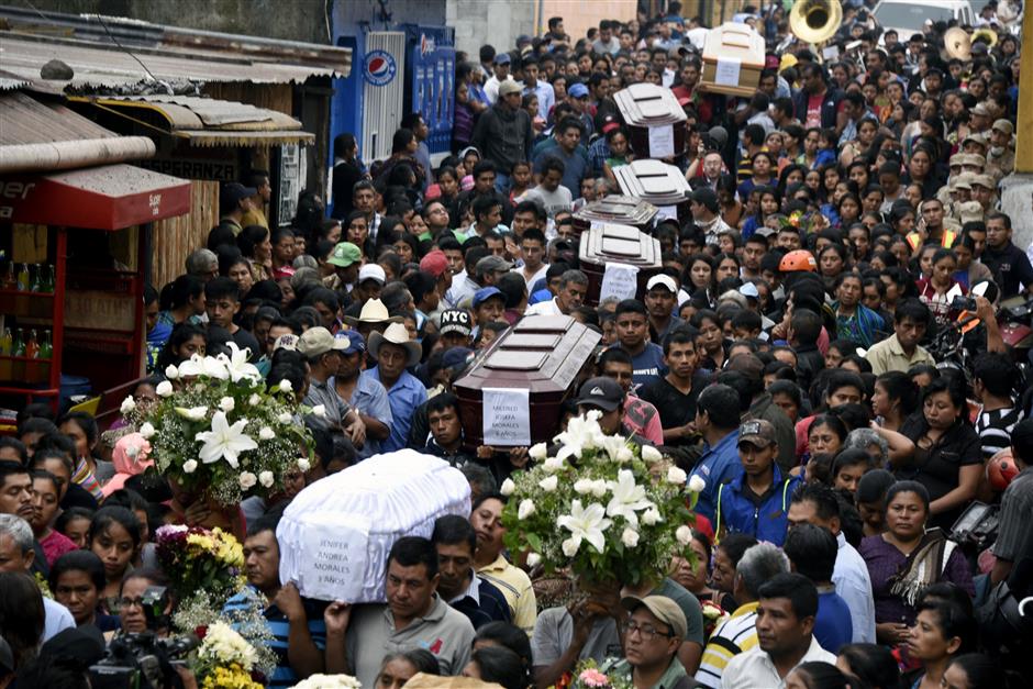 Toll rises to at least 65 in Guatemala volcano as more bodies recovered