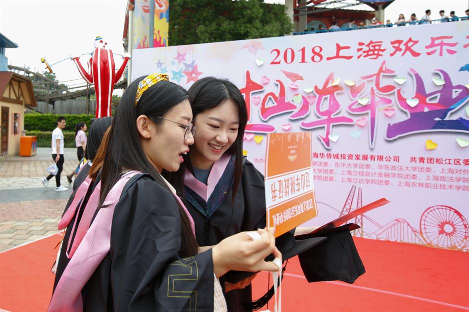 Students fly high in roller coaster graduation ceremony