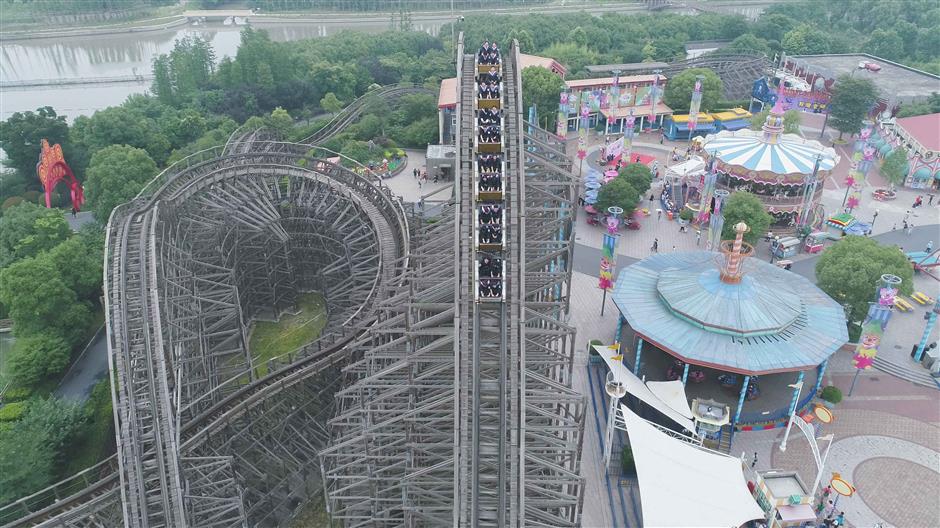 Students fly high in roller coaster graduation ceremony