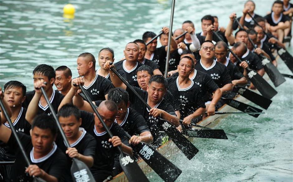 Training for dragon boat race held on Wuyang River in SW China