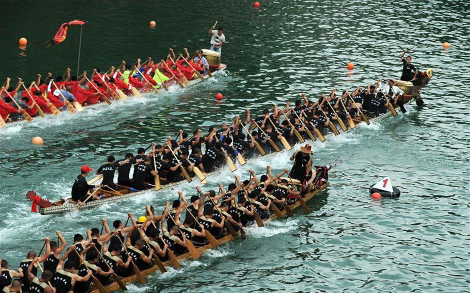 Training for dragon boat race held on Wuyang River in SW China