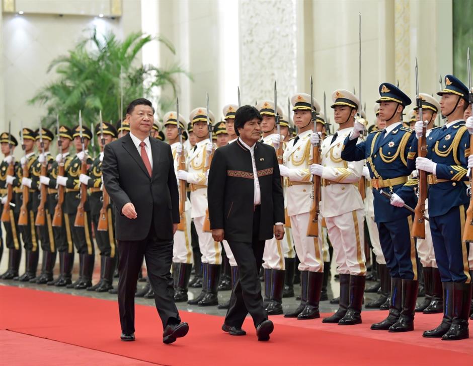 Xi, Morales hold talks, agree to establish China-Bolivia strategic partnership