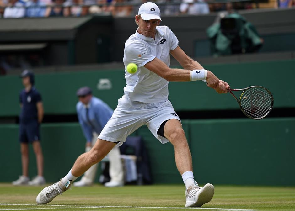 Anderson stuns Federer in last 8