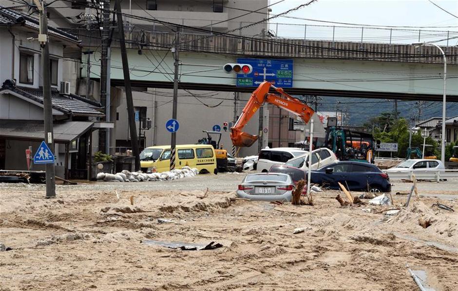 Death toll from torrential rains in western Japan reaches 200, dozens still missing