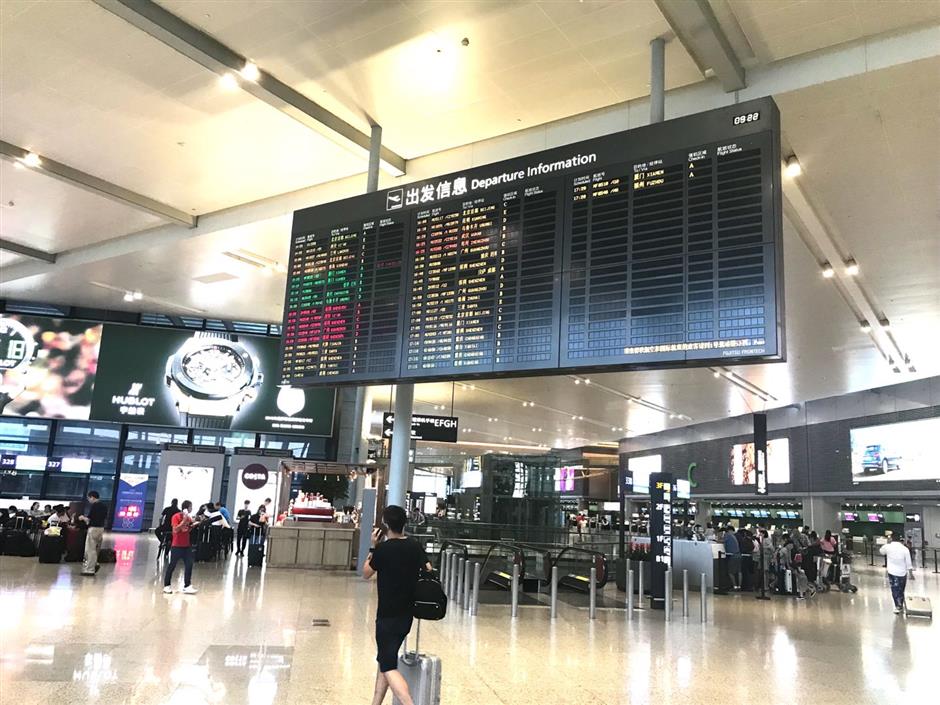 Flights canceled, ferry suspended, expressway closed as typhoon approaches