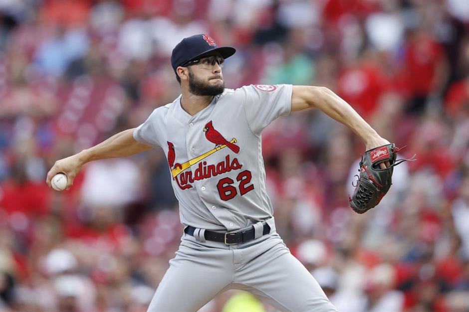 Cards' ace caps comeback from brain surgery