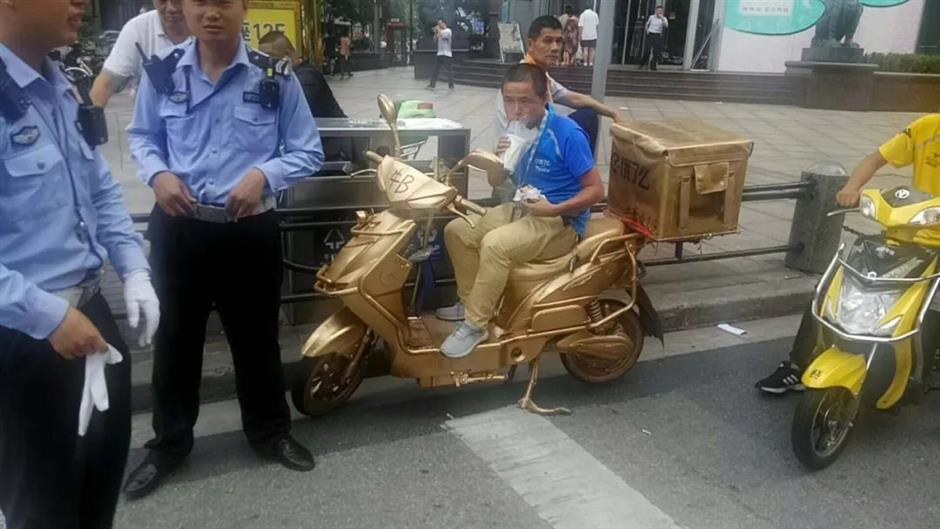 Food deliveryman on 'fancy, gold e-bike' fined