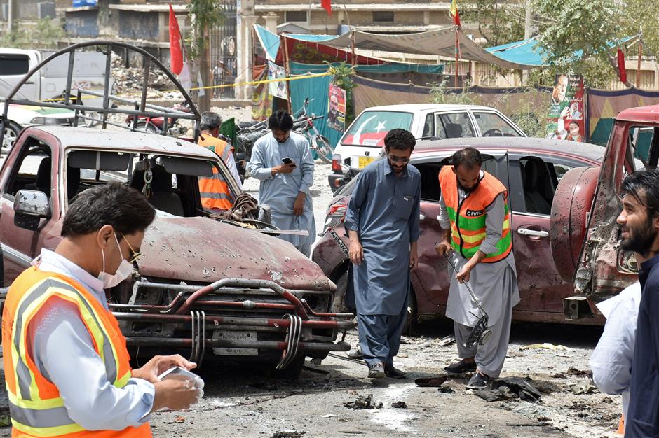 Suicide bomber kills 31 as Pakistan votes