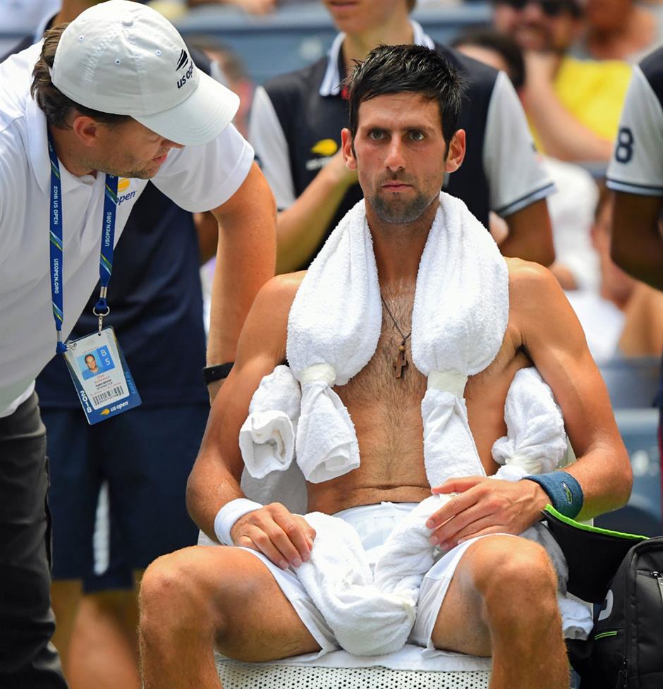 Djokovic survives brutal climate