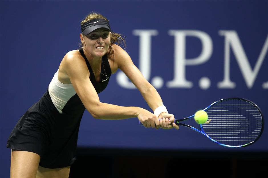 Black night as Federer, Sharapova crash at US Open