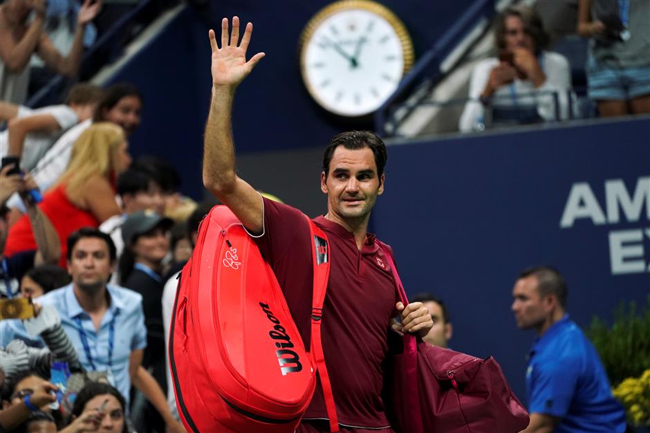 Black night as Federer, Sharapova crash at US Open