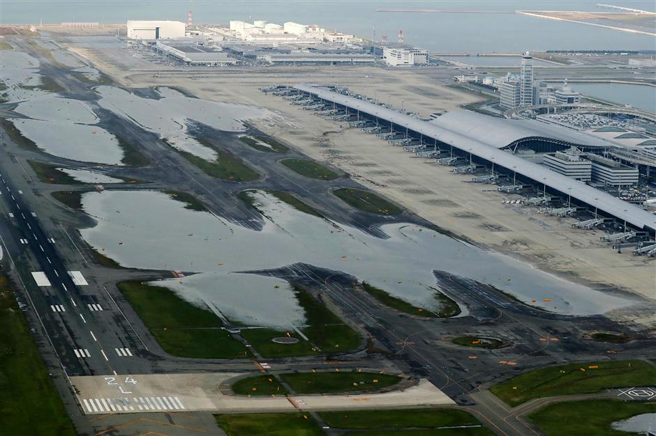 Japan evacuates major airport after typhoon wreaks havoc