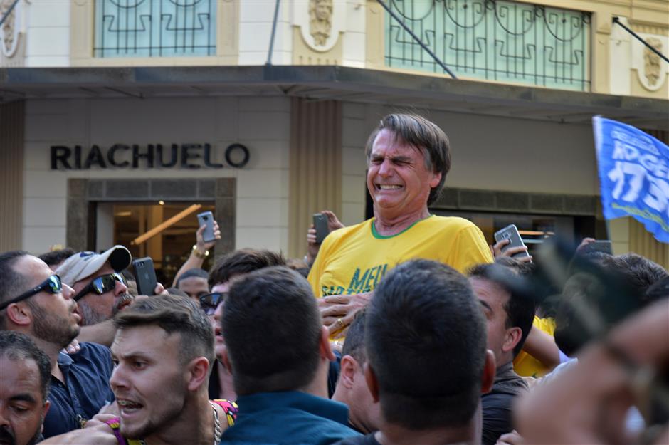 Brazilian presidential candidate Bolsonaro hospitalized for stab wound