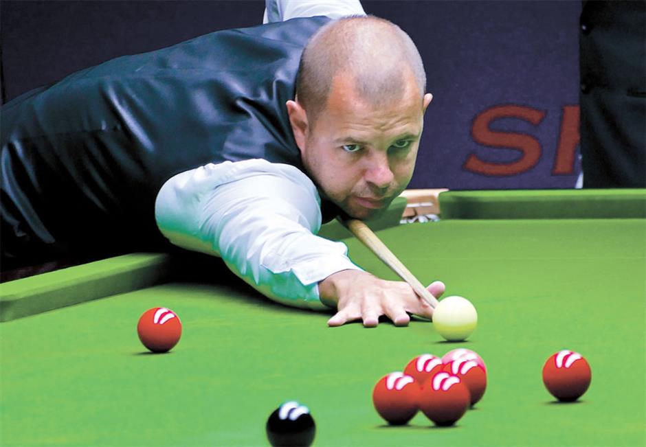 Selby survives scare, Ding through