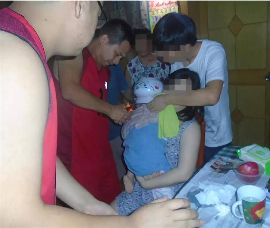 Rescuers free girl stuck in enamel chamber pot