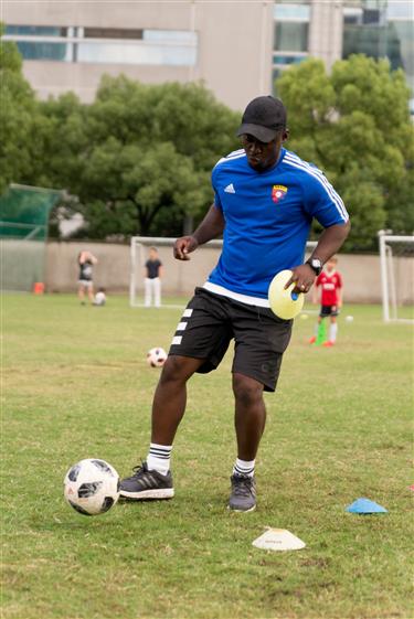 From playing in streets of Accra to Shanghai, coach is pitch perfect