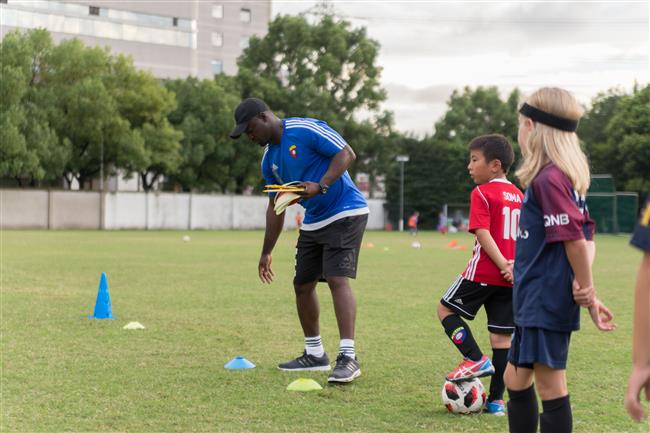 From playing in streets of Accra to Shanghai, coach is pitch perfect