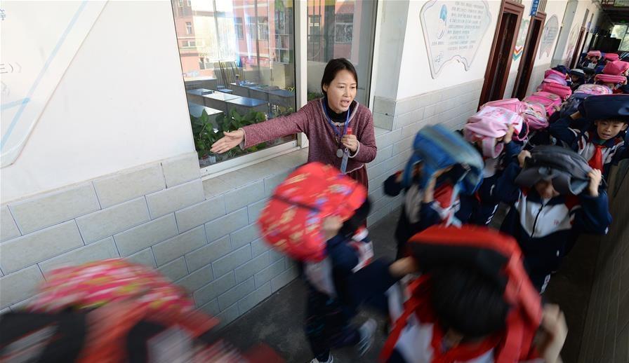 Emergency drills held for students across China to mark Int'l Day for Disaster Reduction