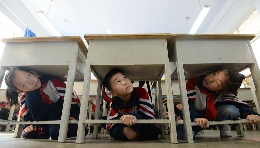 Emergency drills held for students across China to mark Int'l Day for Disaster Reduction