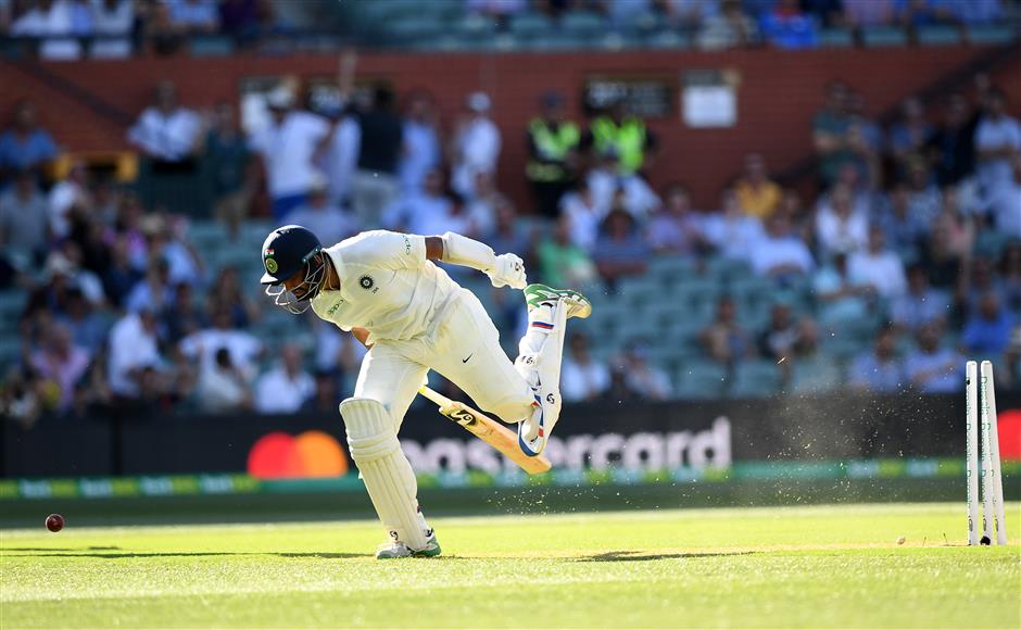 Pujara saves India after superman Kohli falls