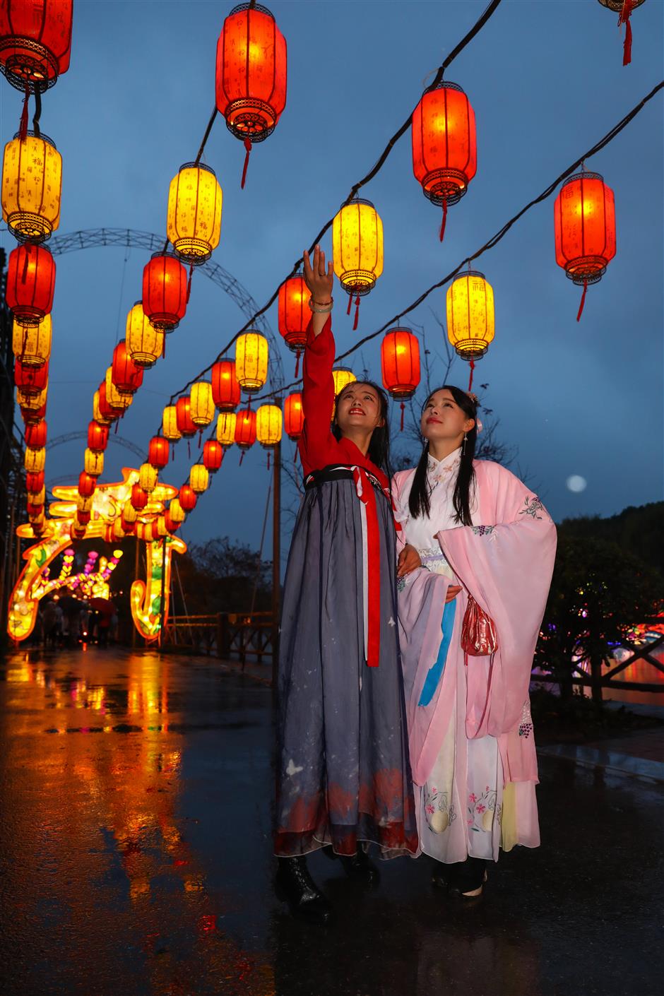 Amusement park lit up for festival