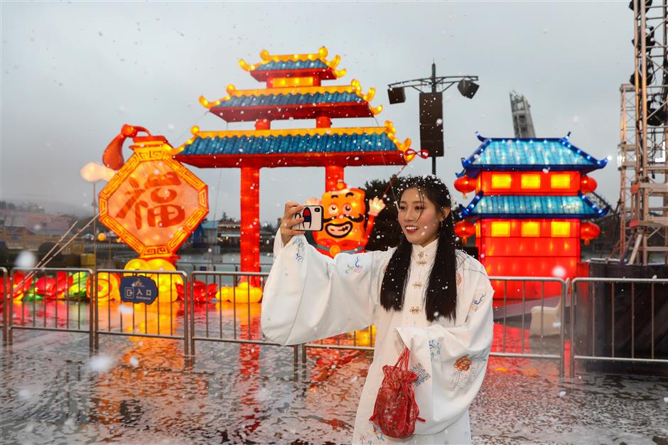 Amusement park lit up for festival