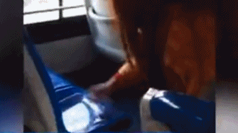Mom cleans up son's vomit on bus, wins praise online