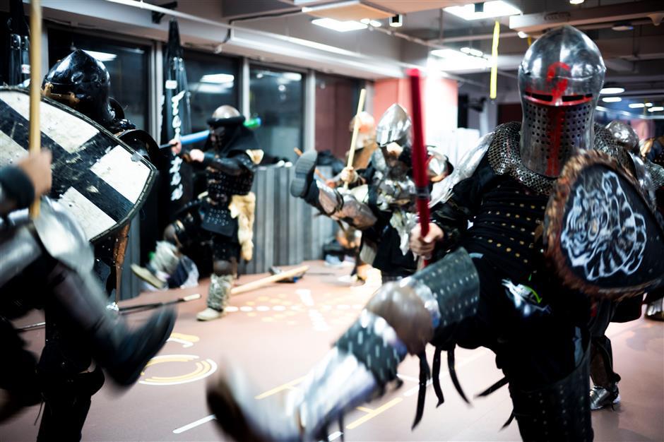 Days at the office, nights in armor