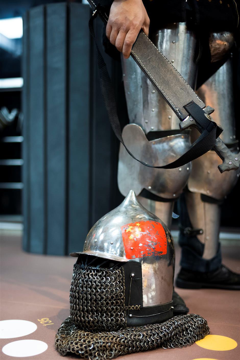 Days at the office, nights in armor