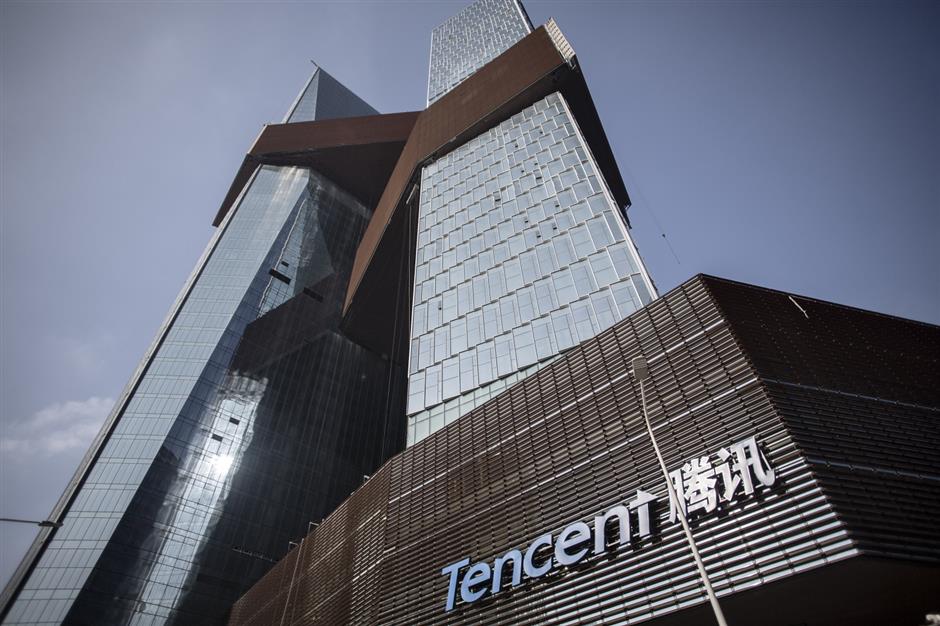 Tencent profit dives, hit by govt gaming freeze