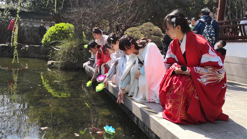 Public come together to worship the flower goddess