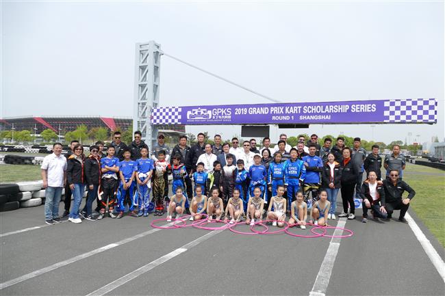 Young drivers exchange skills during kart race