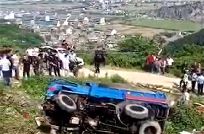 Illegally loaded farm vehicle overturns, killing 12