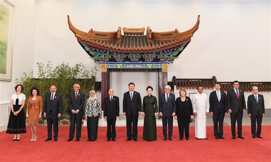 Xi, Peng host banquet for CDAC guests